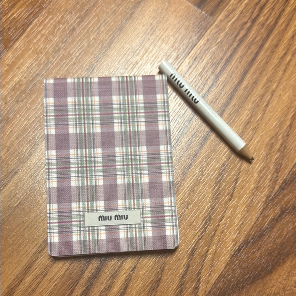 Miu Miu small notebook with pencil